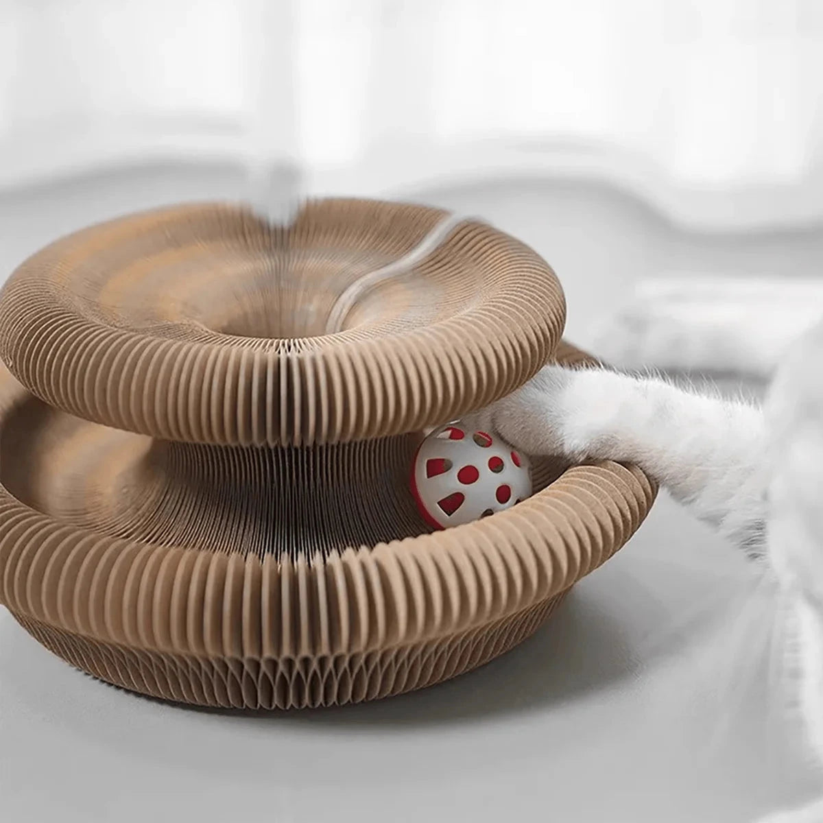 Interactive cat scratcher with back-and-forth design.